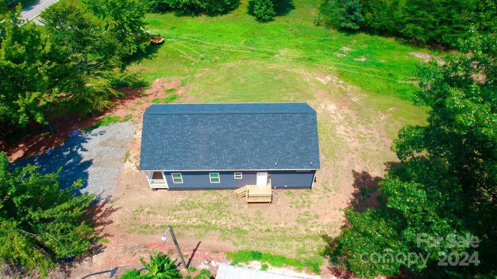 4847 Charlie Crawley Road, Unit 2 Morganton, NC 28655 - Photo 35 of 36 a view of swimming pool with a yard