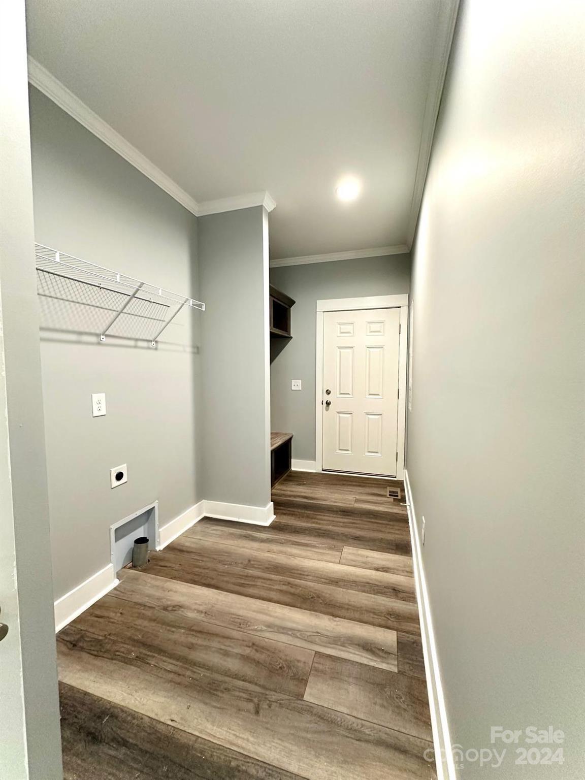 4847 Charlie Crawley Road, Unit 2 Morganton, NC 28655 - Photo 6 of 36 a view of a livingroom with wooden floor and white walls