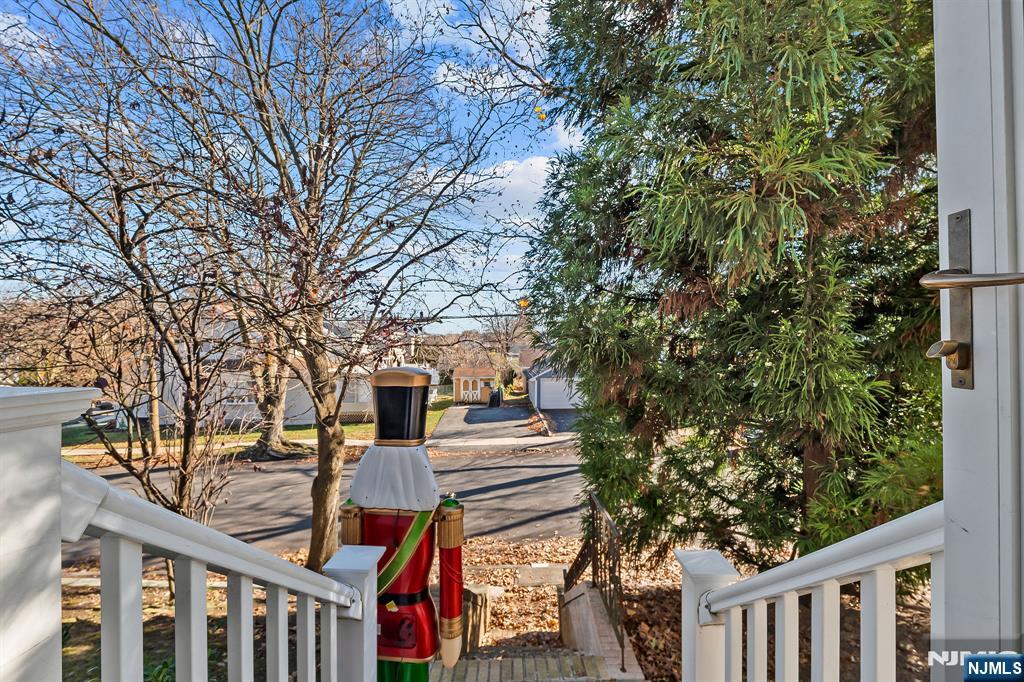 71 Spring Street Nutley, NJ 07110 - Photo 12 of 50 a view of a pathway with a tree