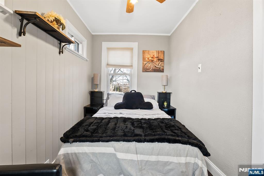 71 Spring Street Nutley, NJ 07110 - Photo 25 of 50 a bedroom with a bed and a window