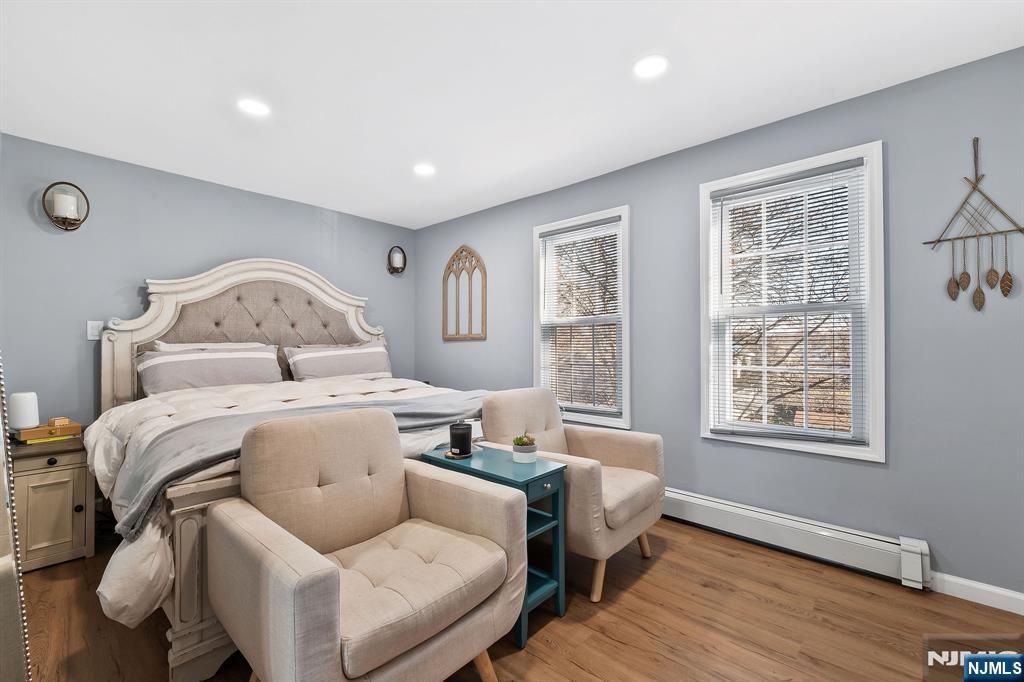 71 Spring Street Nutley, NJ 07110 - Photo 28 of 50 a bedroom with furniture and a window