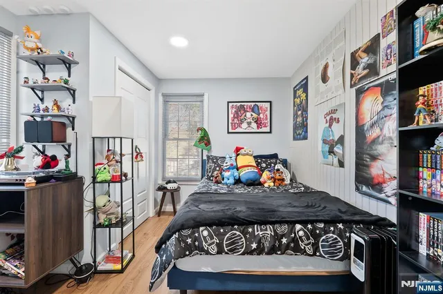 a bathroom with a sink a toilet and shower curtain