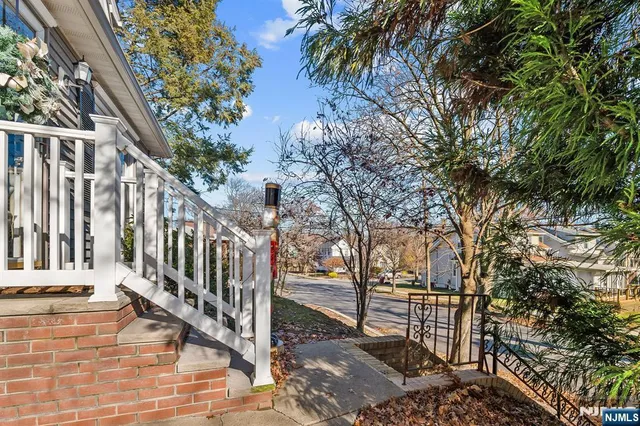 a view of a house with a door and wooden floor
