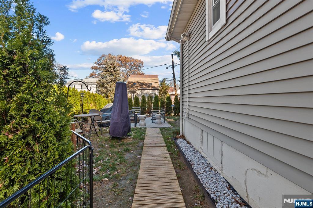 71 Spring Street Nutley, NJ 07110 - Photo 42 of 50 a view of a house with backyard and garden