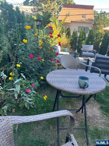 a view of a park with sitting area