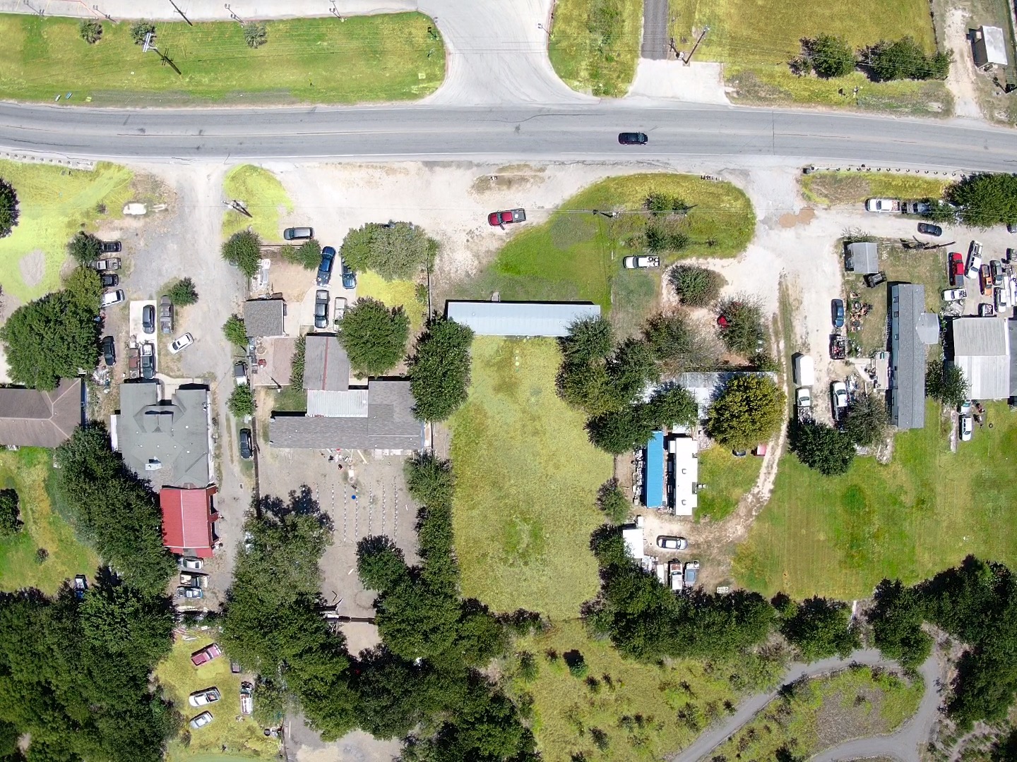3060 FM 2001 Buda, TX 78610 - Photo 3 of 4 an aerial view of residential houses with outdoor space and swimming pool