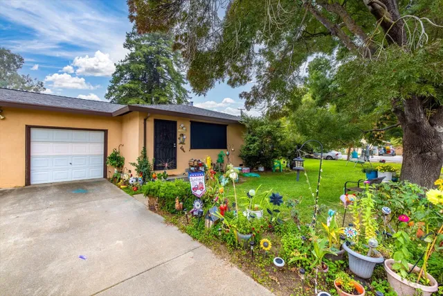 a view of a house with a big yard