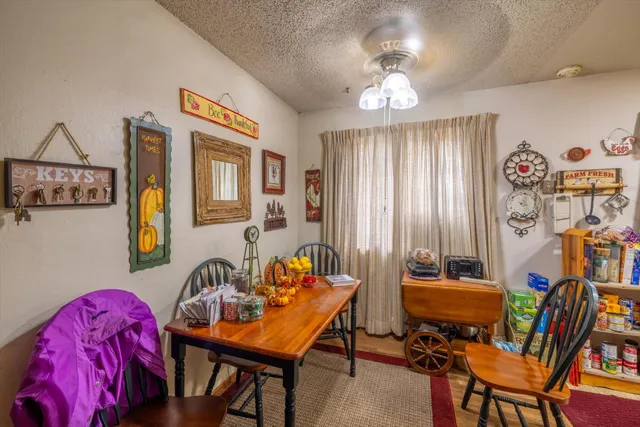 a kitchen that has a sink and a stove in it