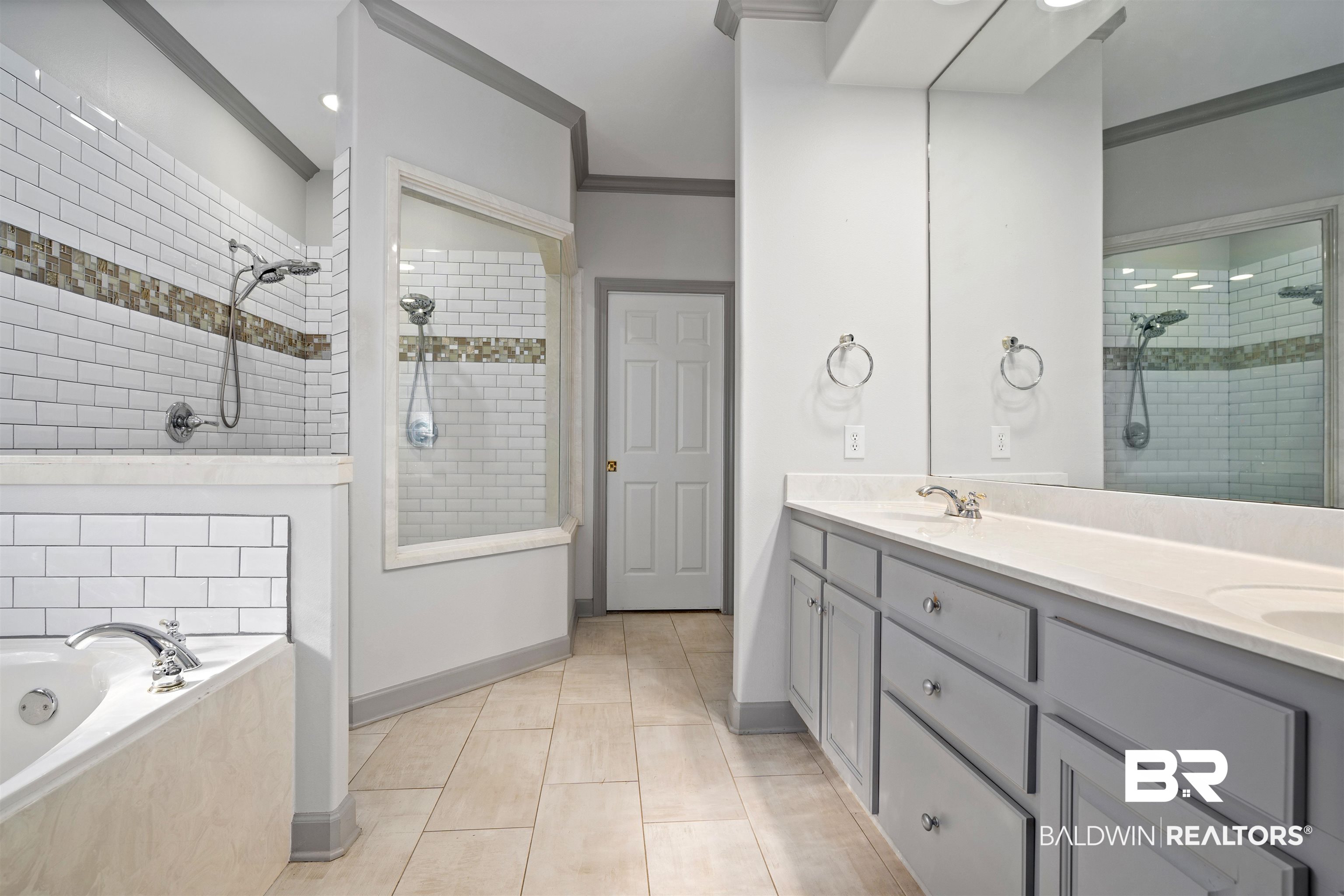 204 General Canby Loop Daphne, AL 36527 - Photo 20 of 36 Bathroom featuring crown molding, vanity, and independent shower and bath