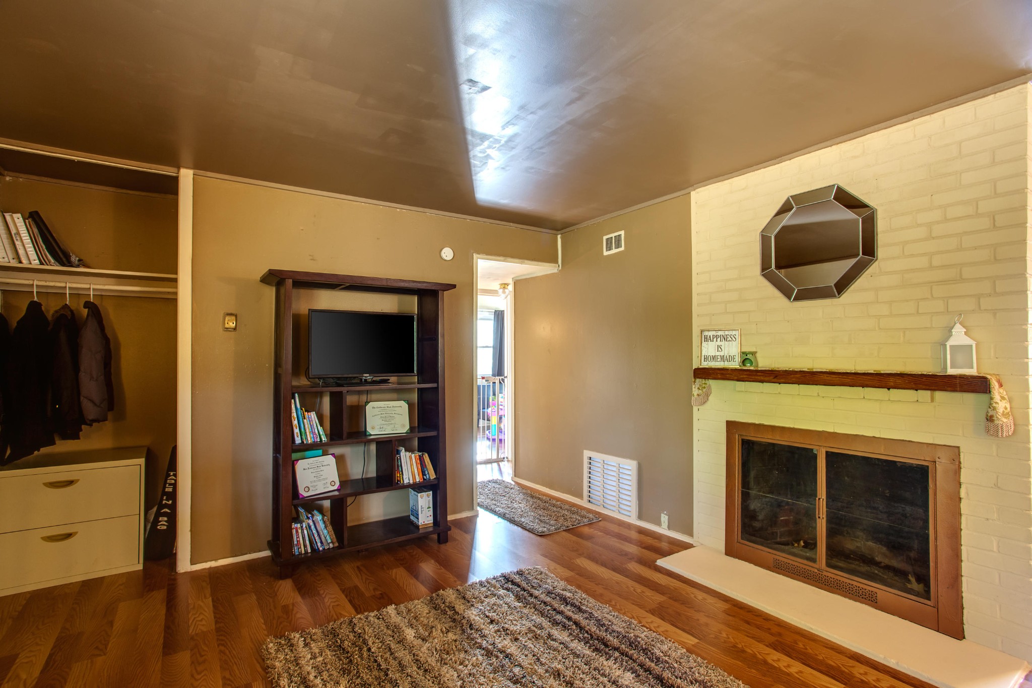 105 Kenwyn Road Oak Ridge, TN 37830 - Photo 11 of 22 a living room with furniture and a fireplace