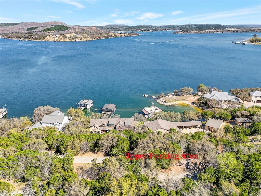 2127 Trail Ridge Road Graford, TX 76449 - Photo 33 of 34 a view of a lake with a mountain