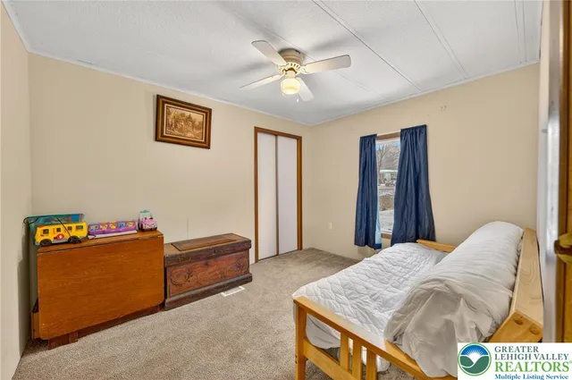 a bed room with a bed and a couch