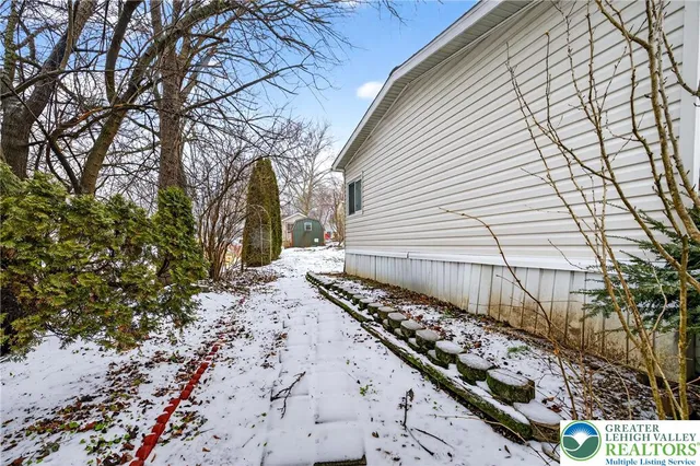 a sign board with a yard