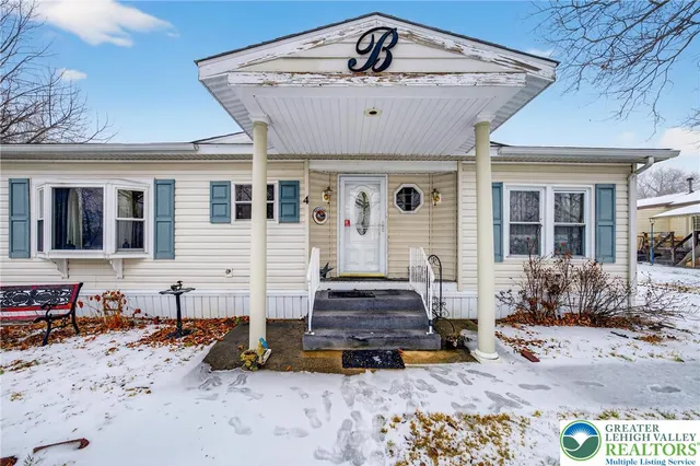 a view of a house with a patio