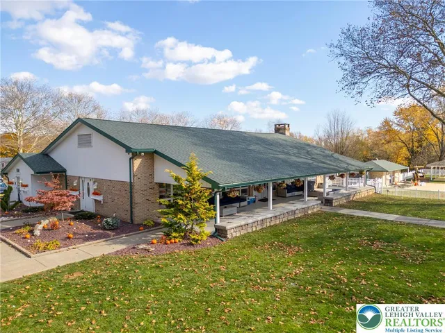 a view of yard with swimming pool