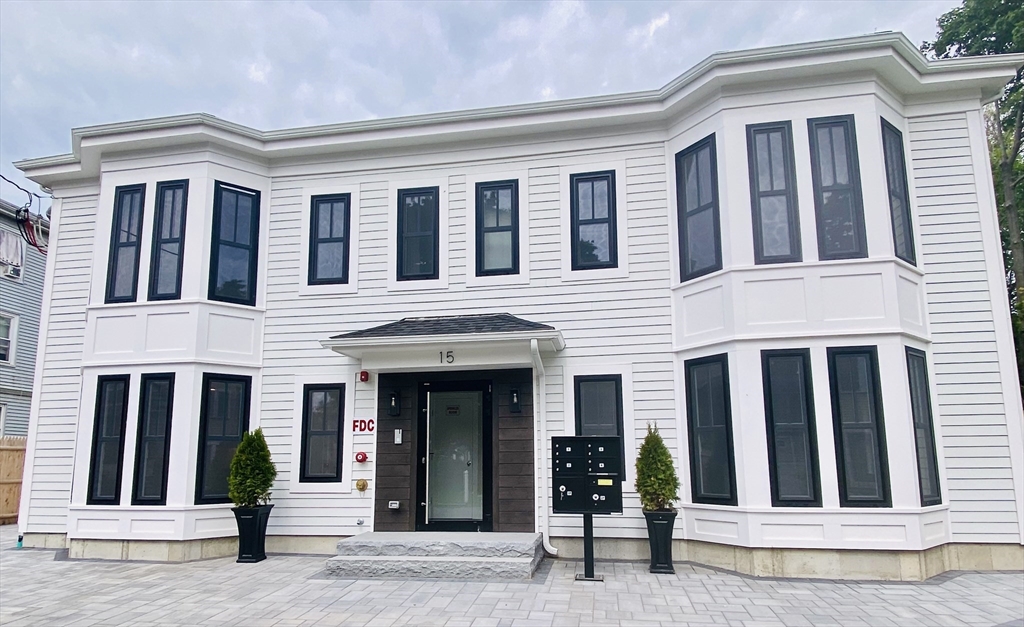15 Yuill Circle, Unit 2 Boston, MA 02136 - Photo 14 of 16 front view of building with a entrance
