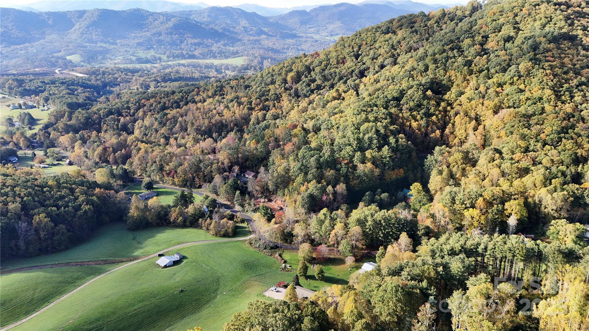 2 Roberts Mountain Road, Unit 2 Clyde, NC 28721 - Photo 15 of 28 a view of a lush green field