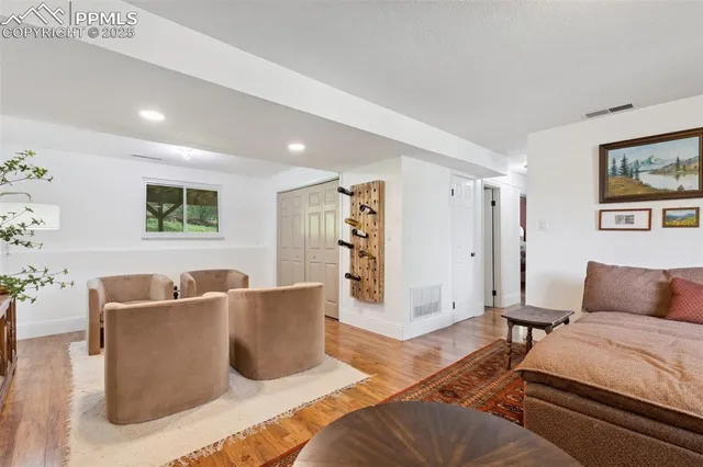 a bedroom with furniture and a bed