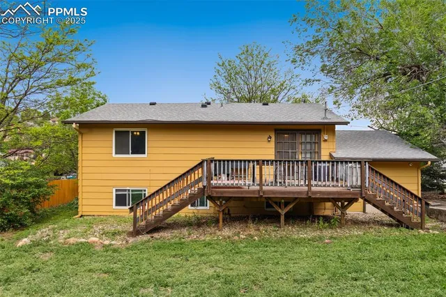 a view of a house with a roof deck