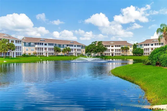 a view of a lake with a city view