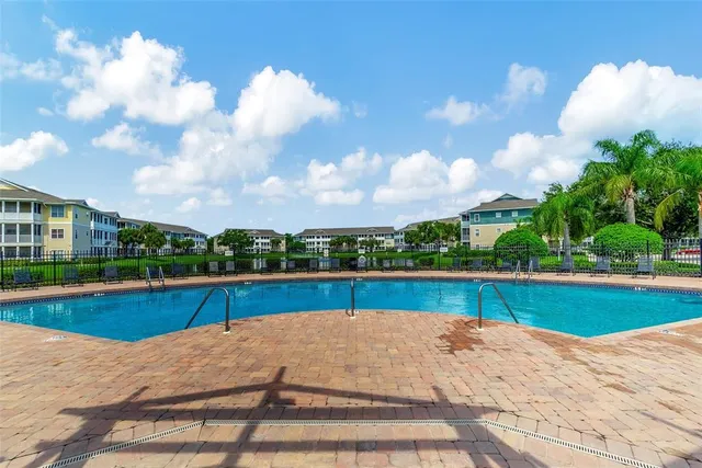 a view of swimming pool and lake