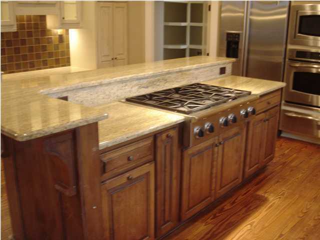 134 Grayton Trail Road Santa Rosa Beach, FL 32459 - Photo 5 of 21 a kitchen with stainless steel appliances granite countertop a stove a sink and a refrigerator