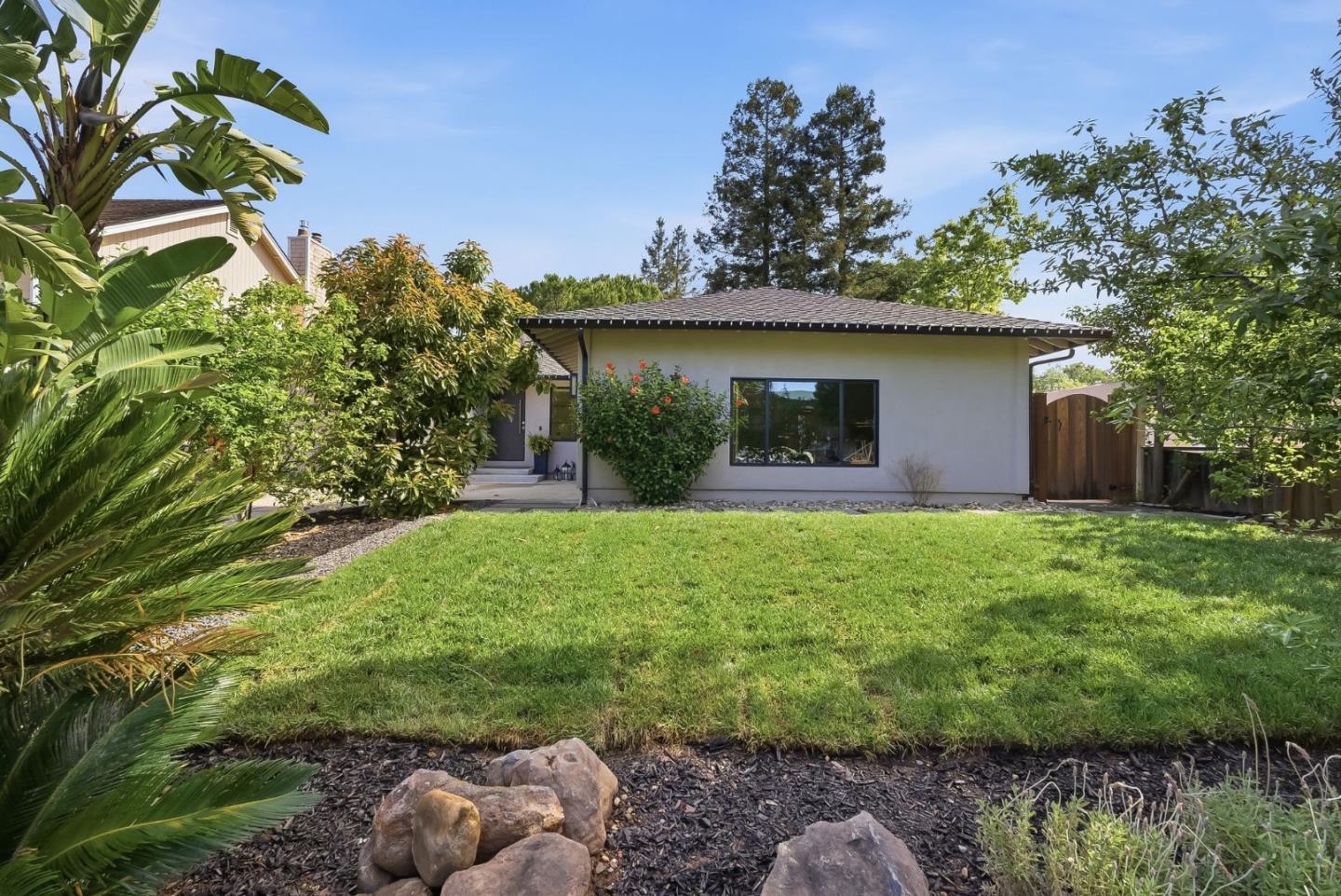 845 Pollard Road Los Gatos, CA 95032 - Photo 2 of 47 a view of a house with a yard and a tree