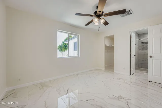 a bathroom with a sink a vanity and mirror