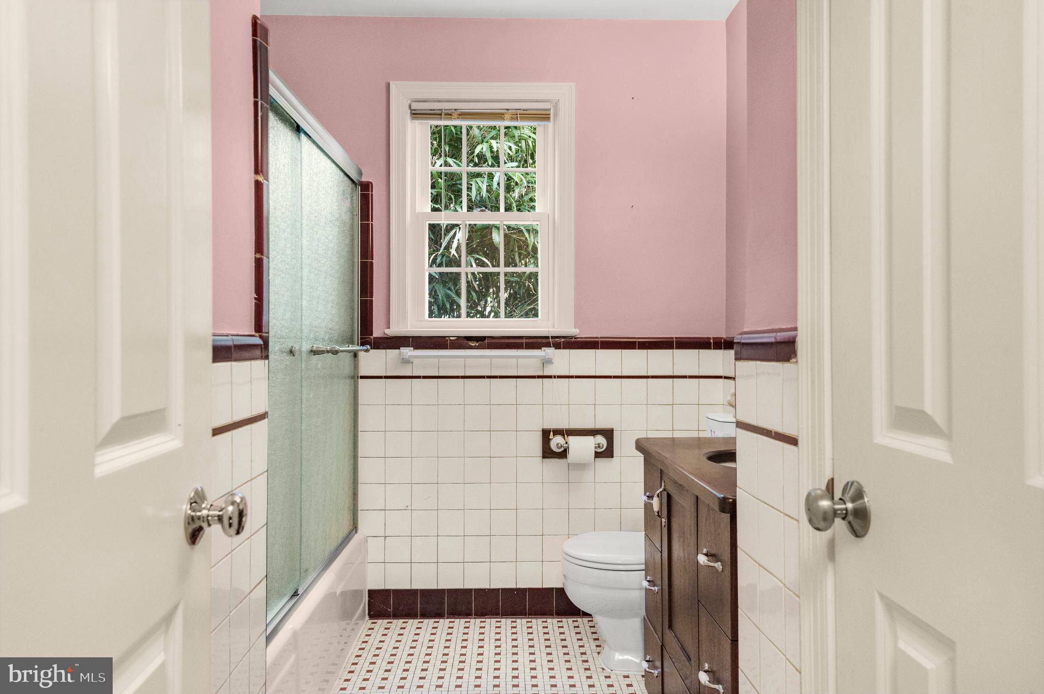 9505 Riley Road Silver Spring, MD 20910 - Photo 19 of 41 a bathroom with a sink a toilet and shower