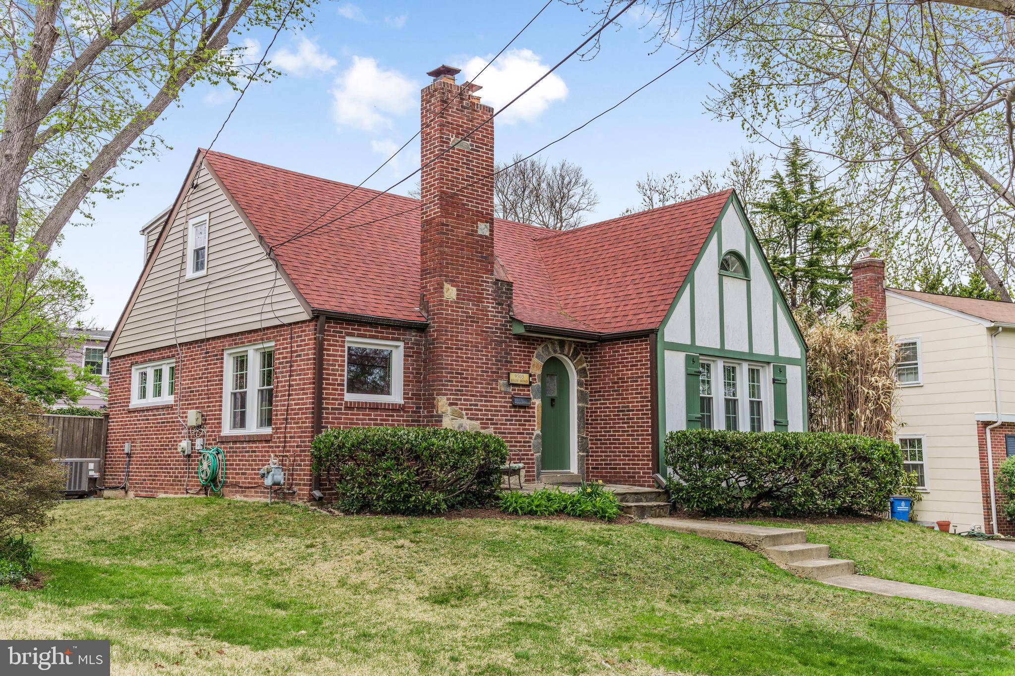 9505 Riley Road Silver Spring, MD 20910 - Photo 3 of 41 a front view of a house with a yard