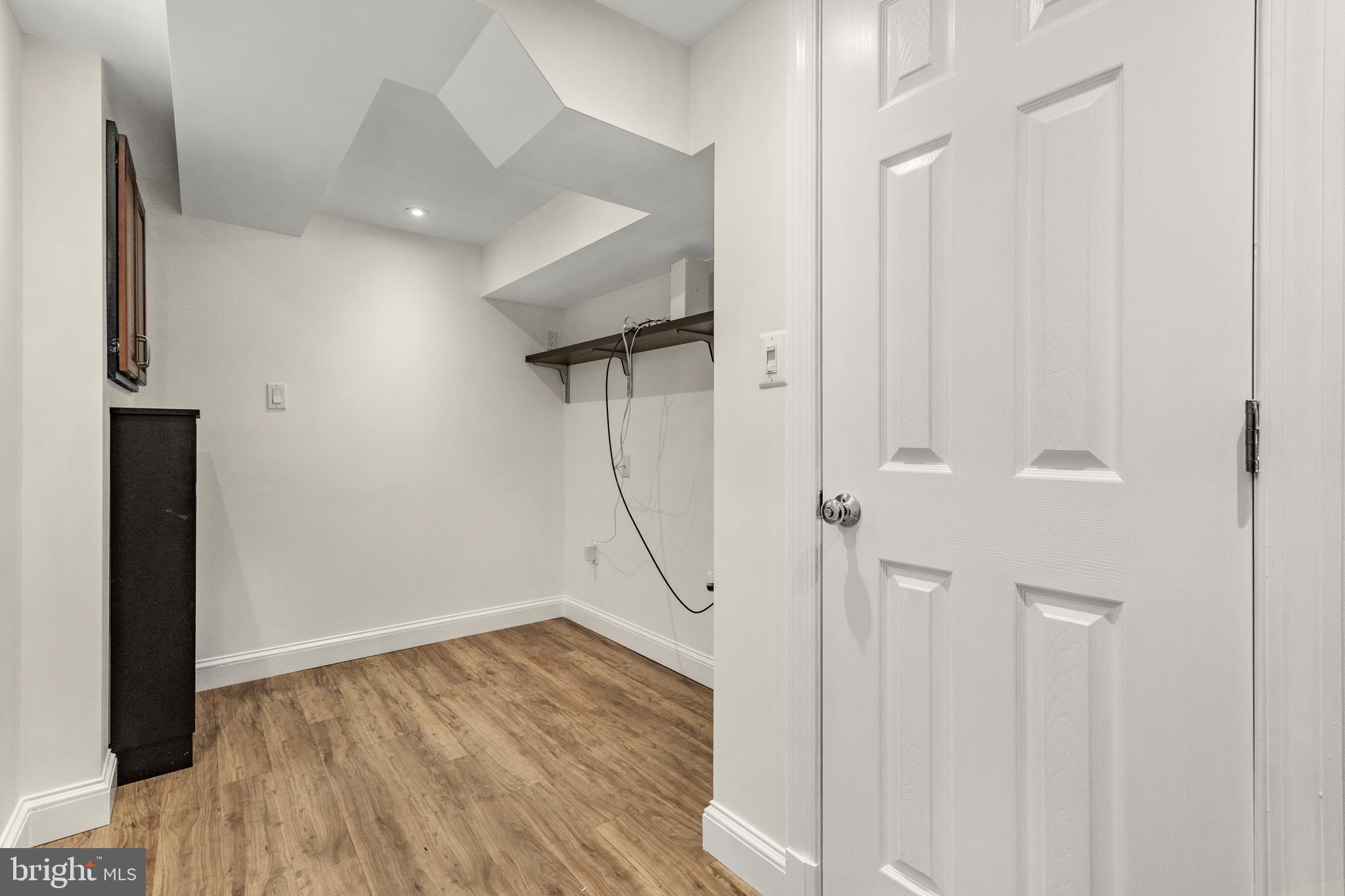 9505 Riley Road Silver Spring, MD 20910 - Photo 34 of 41 a view of room with wooden floor