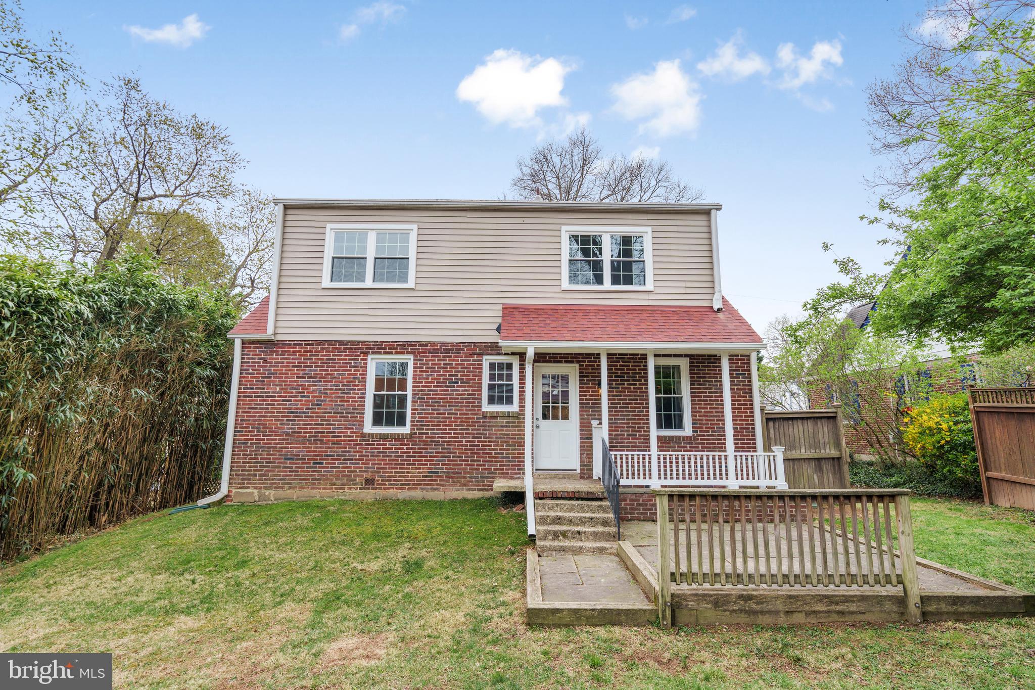 9505 Riley Road Silver Spring, MD 20910 - Photo 35 of 41 a front view of a house with a yard