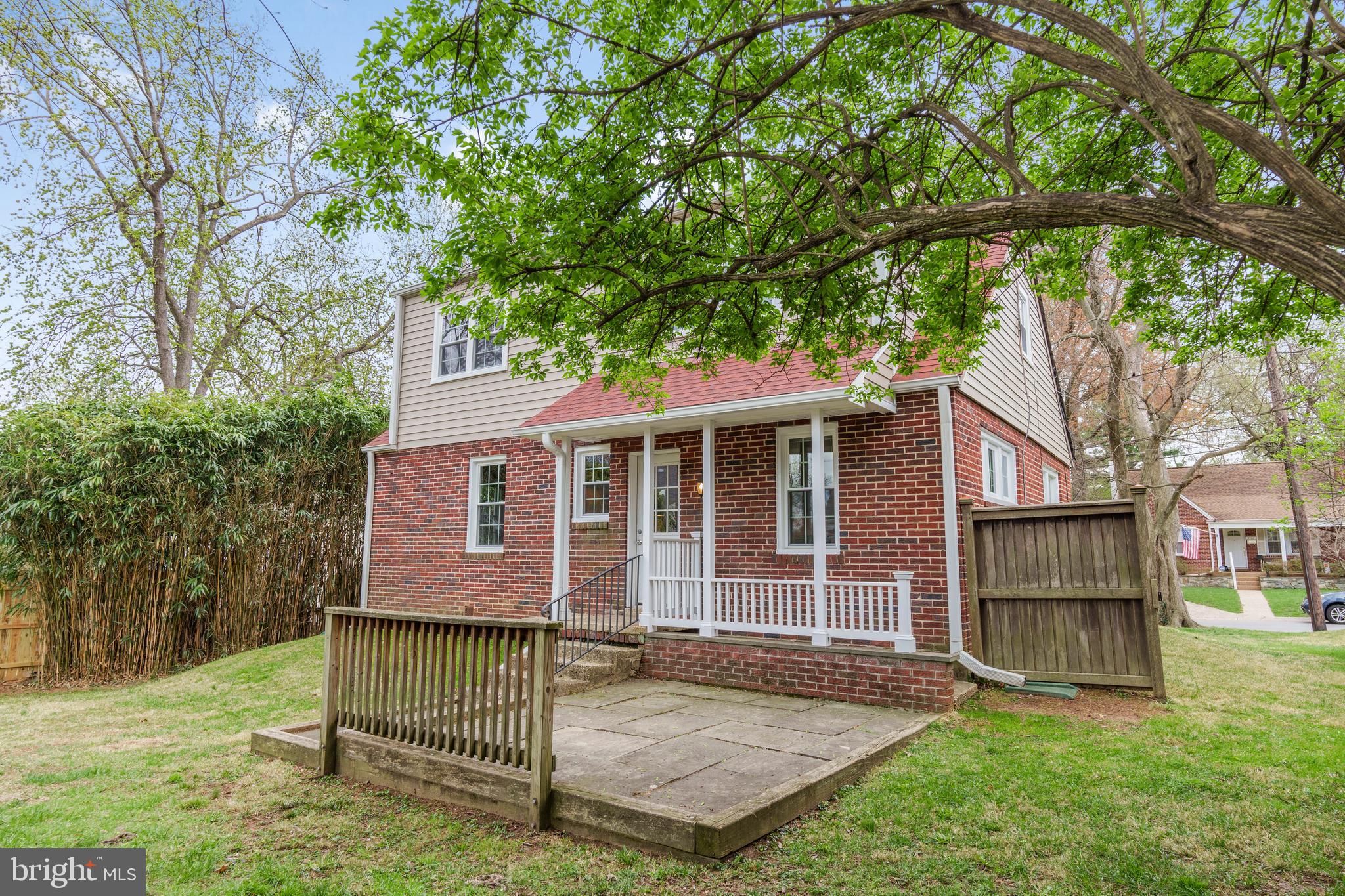 9505 Riley Road Silver Spring, MD 20910 - Photo 37 of 41 a view of a house with a yard and tree