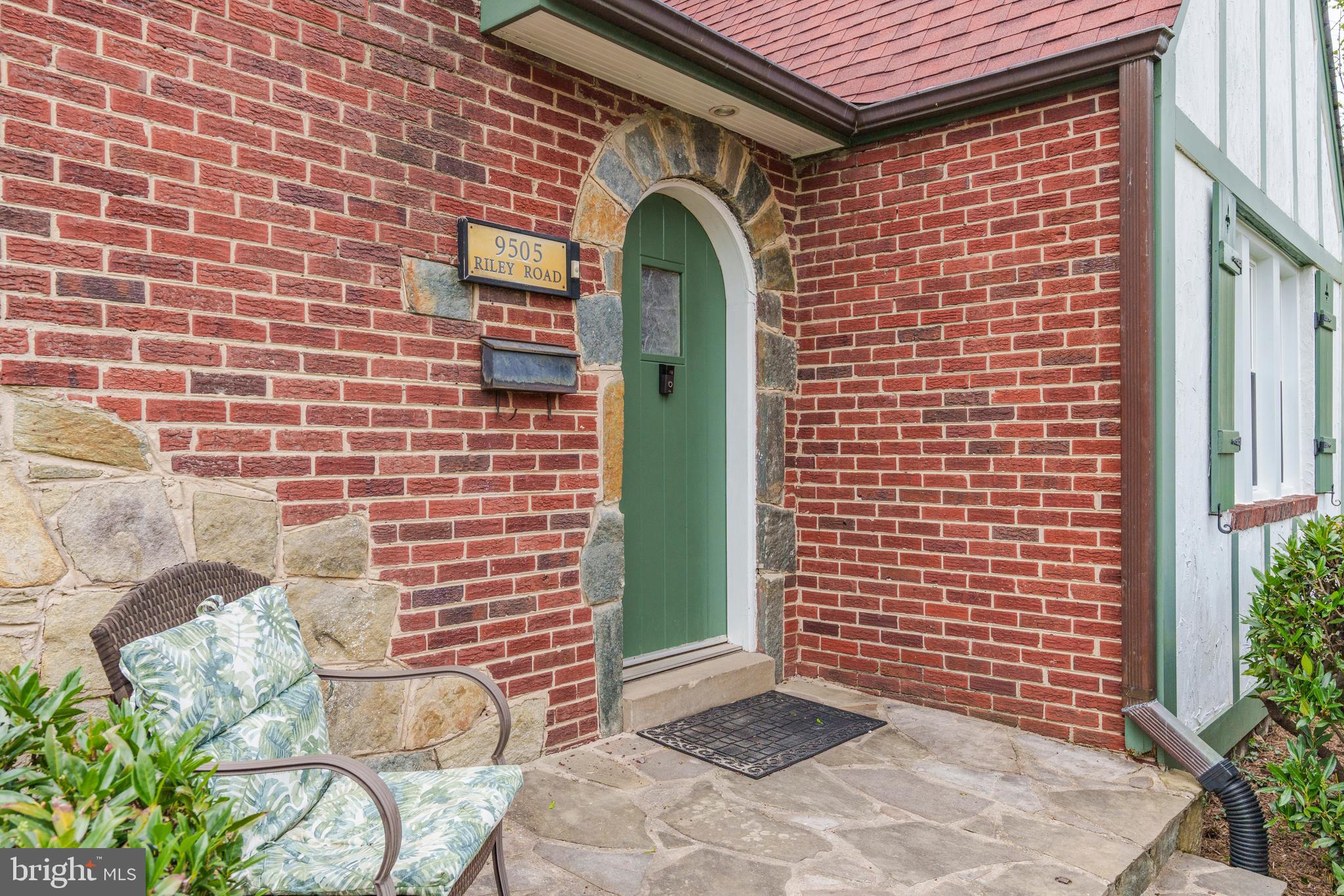 9505 Riley Road Silver Spring, MD 20910 - Photo 5 of 41 a front view of a house with a garden