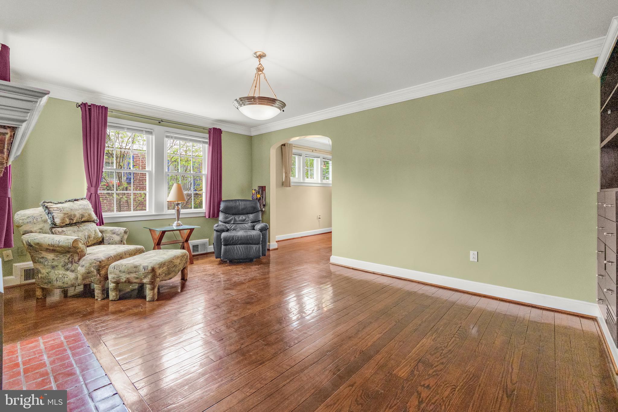 9505 Riley Road Silver Spring, MD 20910 - Photo 8 of 41 a living room with furniture and a chandelier