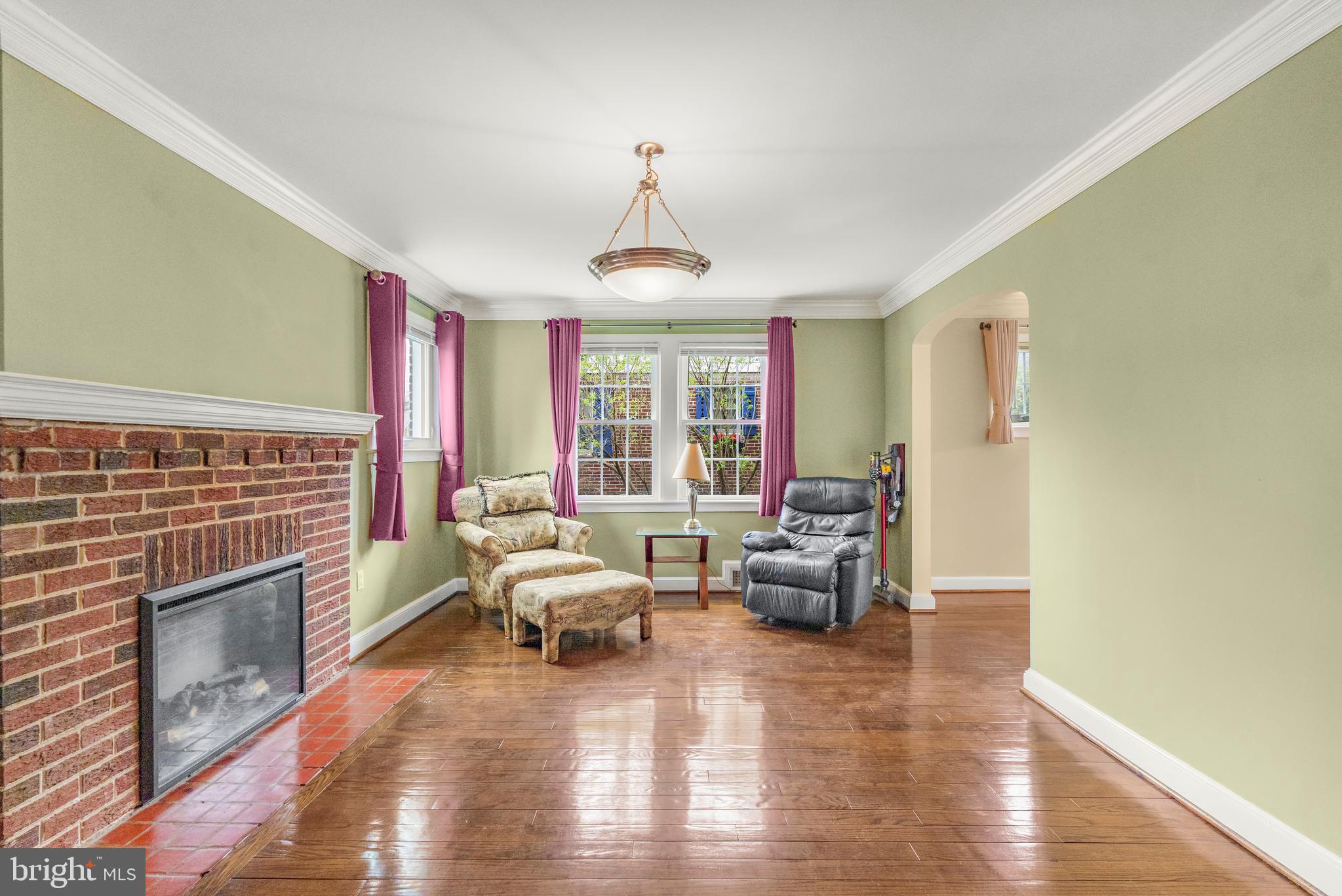 9505 Riley Road Silver Spring, MD 20910 - Photo 9 of 41 a living room with furniture window and wooden floor