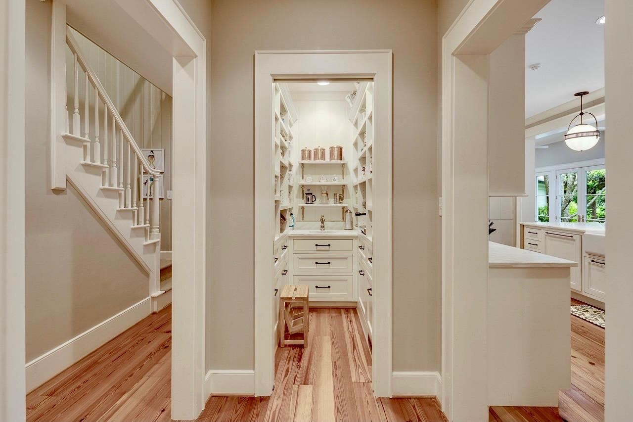 4315 Tuckahoe Road Memphis, TN 38117 - Photo 13 of 25 a view of a hallway with wooden floor and staircase