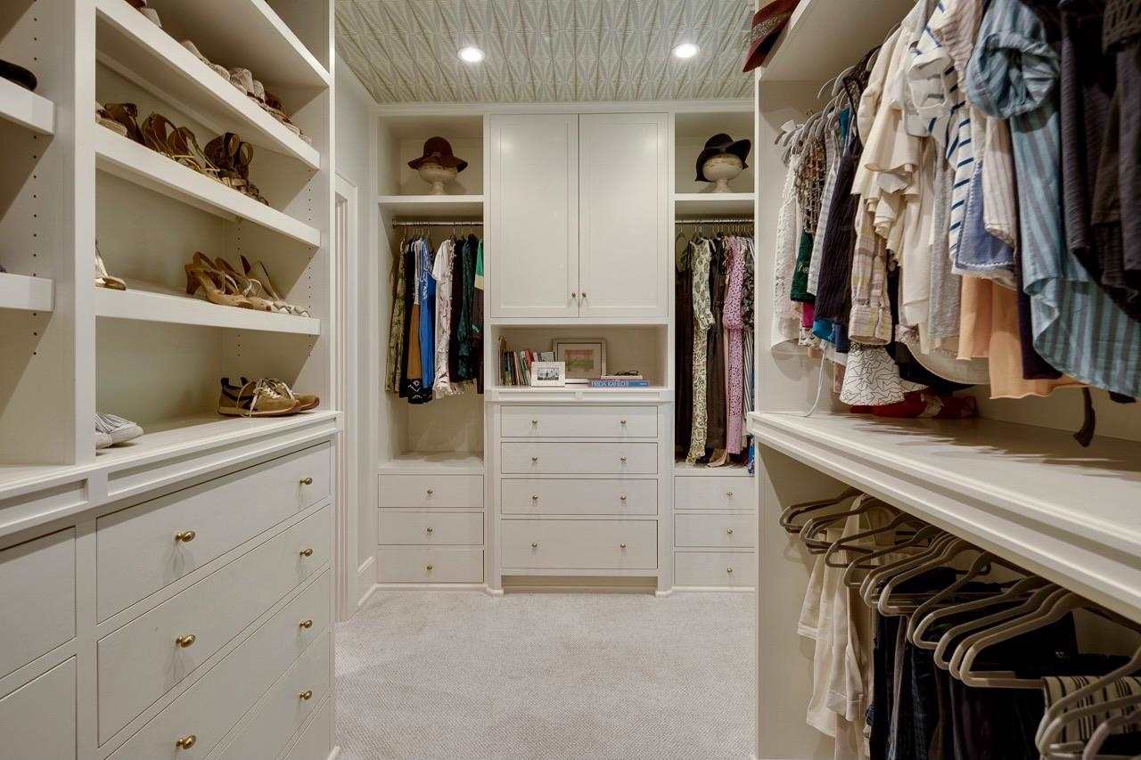 4315 Tuckahoe Road Memphis, TN 38117 - Photo 16 of 25 a view of walk in closet with clothes and shoes