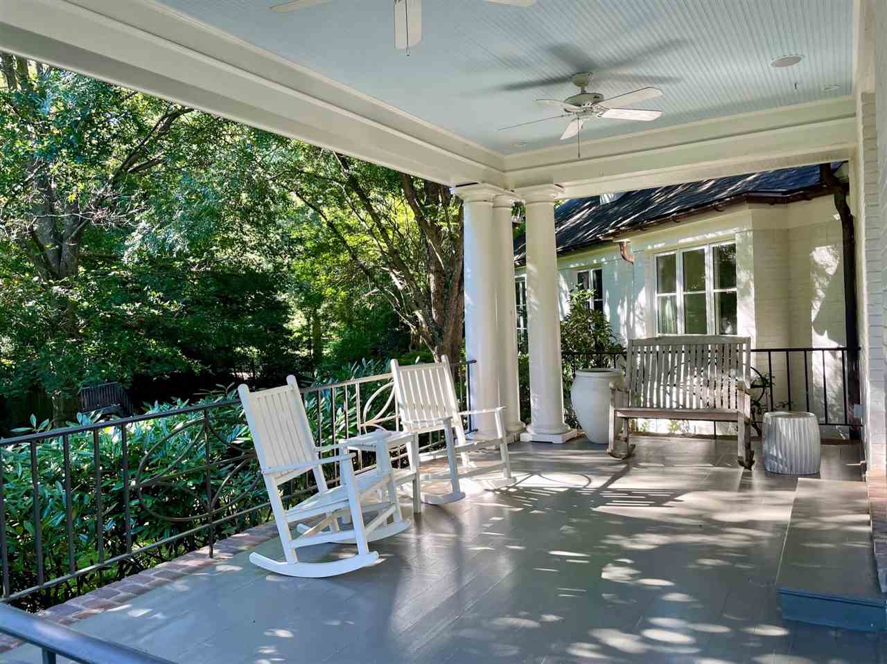 4315 Tuckahoe Road Memphis, TN 38117 - Photo 22 of 25 a view of a patio with table and chairs and potted plants