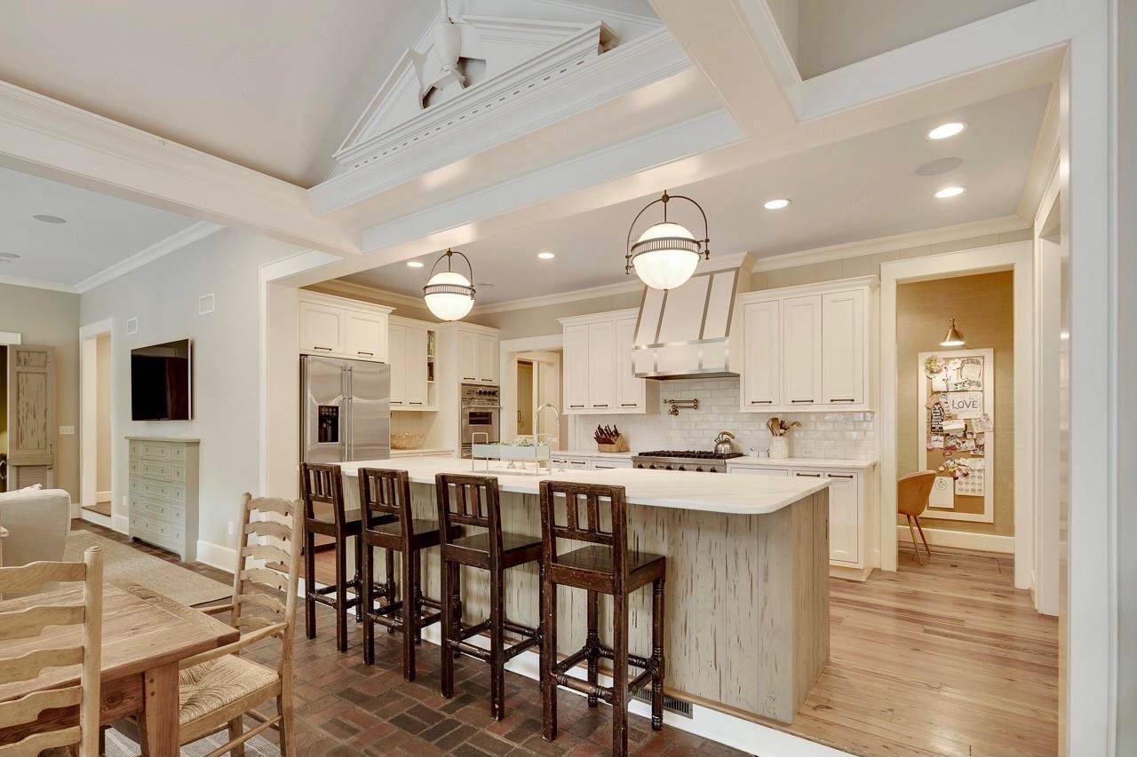 4315 Tuckahoe Road Memphis, TN 38117 - Photo 6 of 25 a large kitchen with a table and chairs