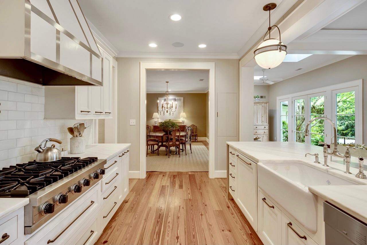 4315 Tuckahoe Road Memphis, TN 38117 - Photo 7 of 25 a kitchen with stove and wooden floor