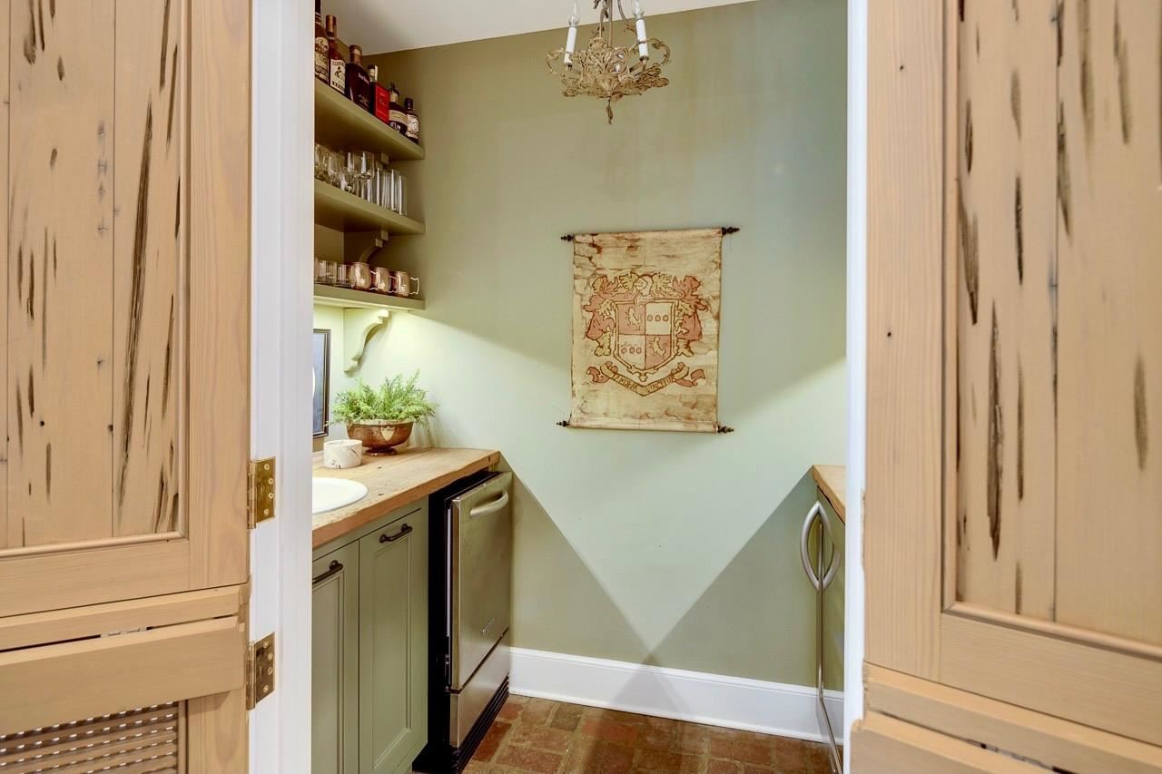 4315 Tuckahoe Road Memphis, TN 38117 - Photo 10 of 25 a view of a hallway with entryway and furniture
