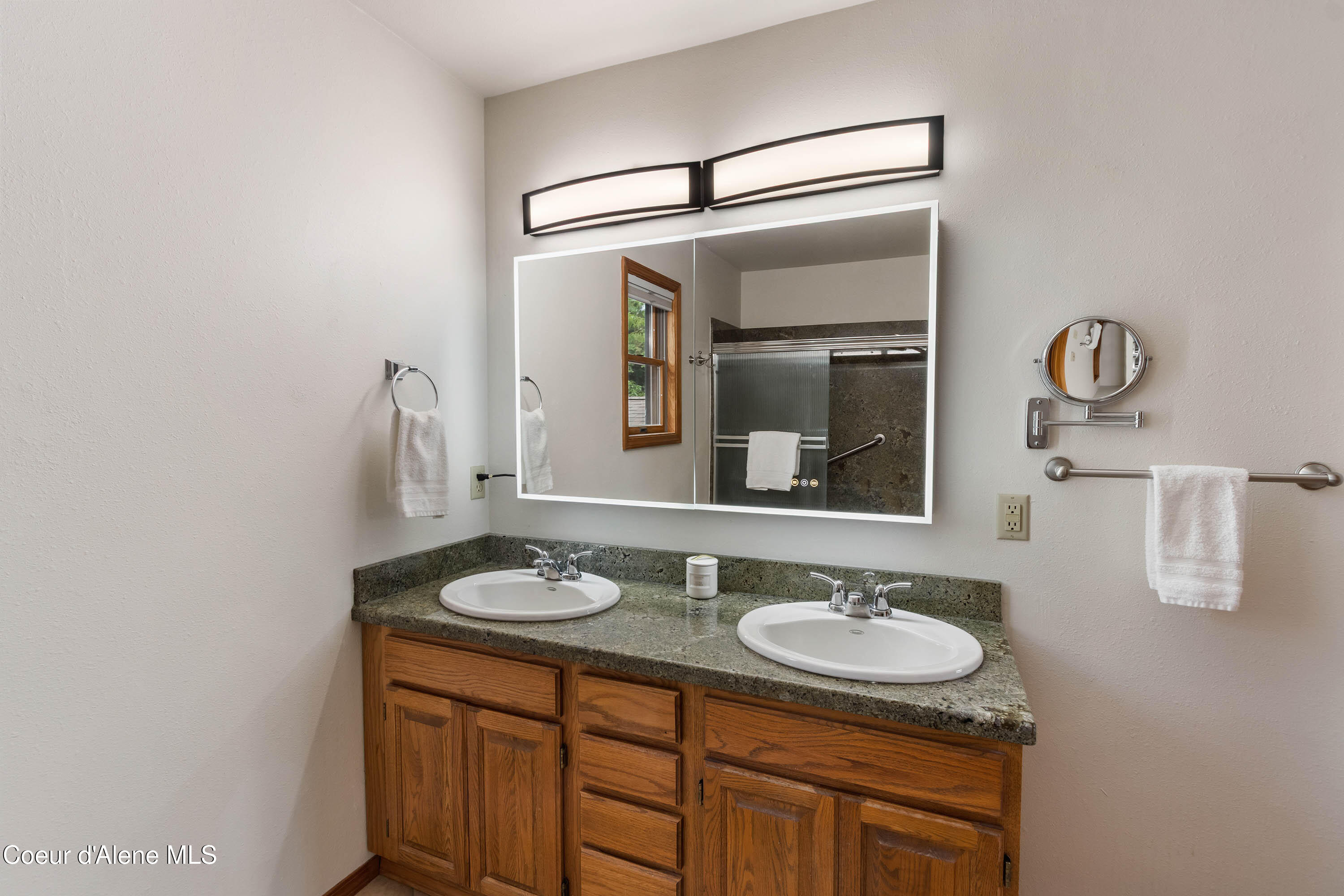 2385 Sunnyside Road Sandpoint, ID 83864 - Photo 27 of 64 Upstairs Bathroom Vanity