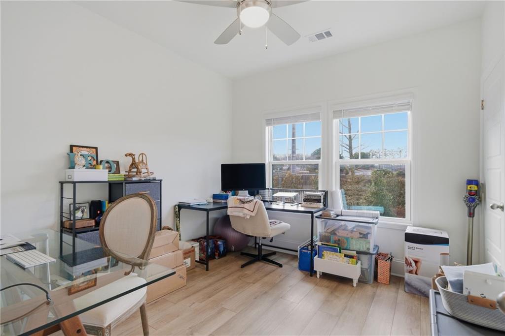 3158 Webb Road Milton, GA 30004 - Photo 16 of 36 a workspace with furniture window and wooden floor