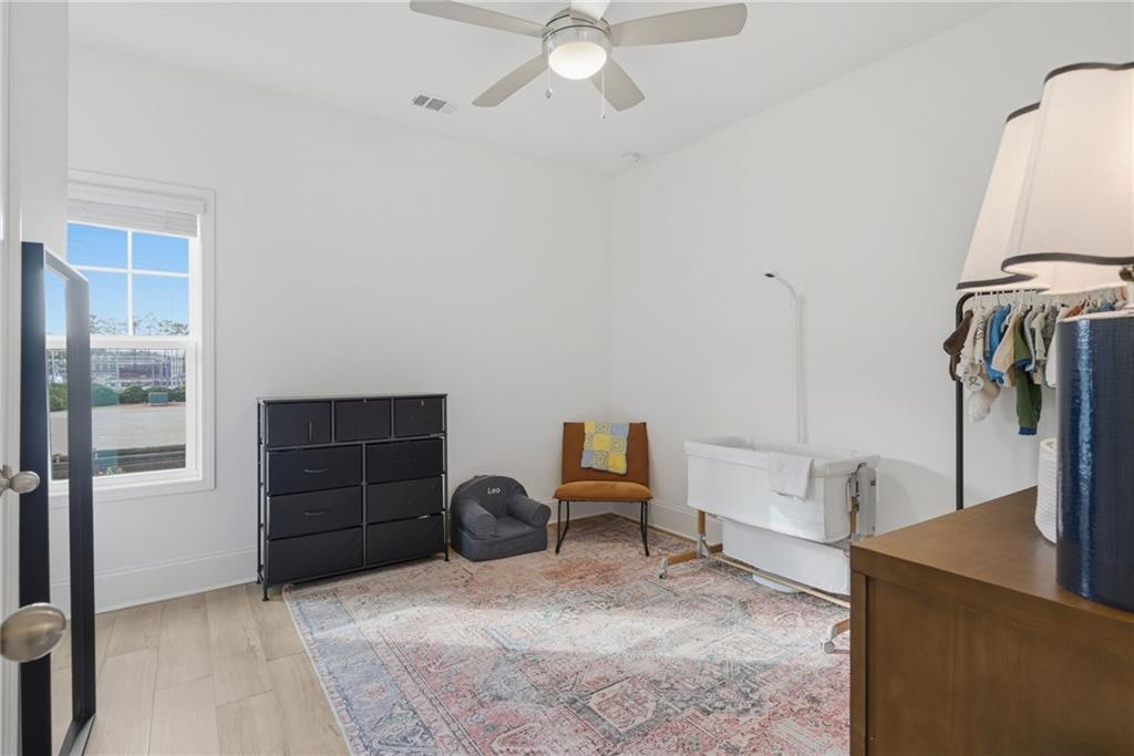 3158 Webb Road Milton, GA 30004 - Photo 23 of 36 a view of a livingroom with furniture and staircase