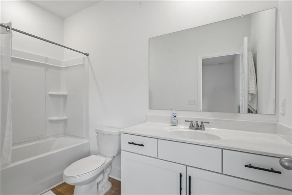 3158 Webb Road Milton, GA 30004 - Photo 24 of 36 a bathroom with a sink toilet vanity tub and shower
