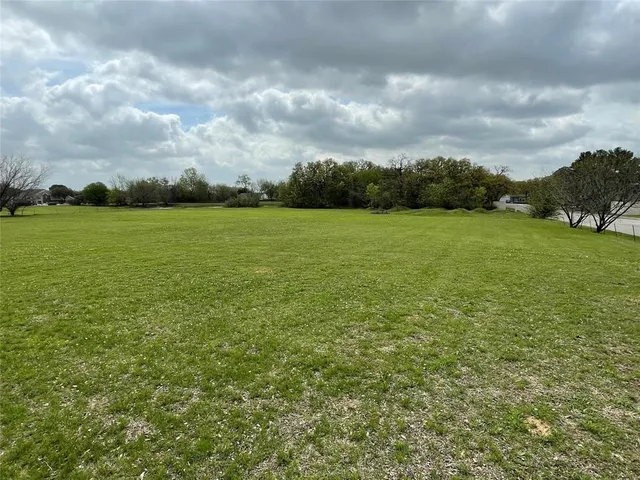 a view of swimming pool from a balcony