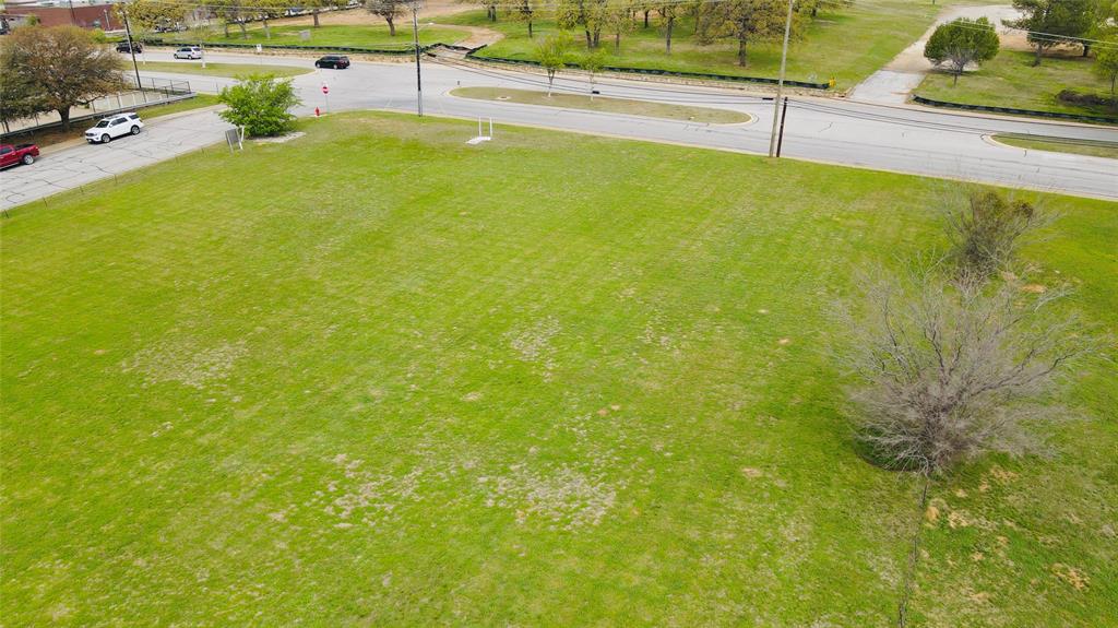 3708 Harwood Road Bedford, TX 76021 - Photo 7 of 18 a view of an outdoor space and swimming pool