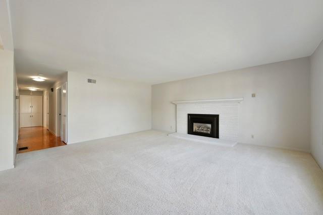 1501 Lloyd Way Mountain View, CA 94040 - Photo 2 of 8 a view of an empty room with a fireplace and a window