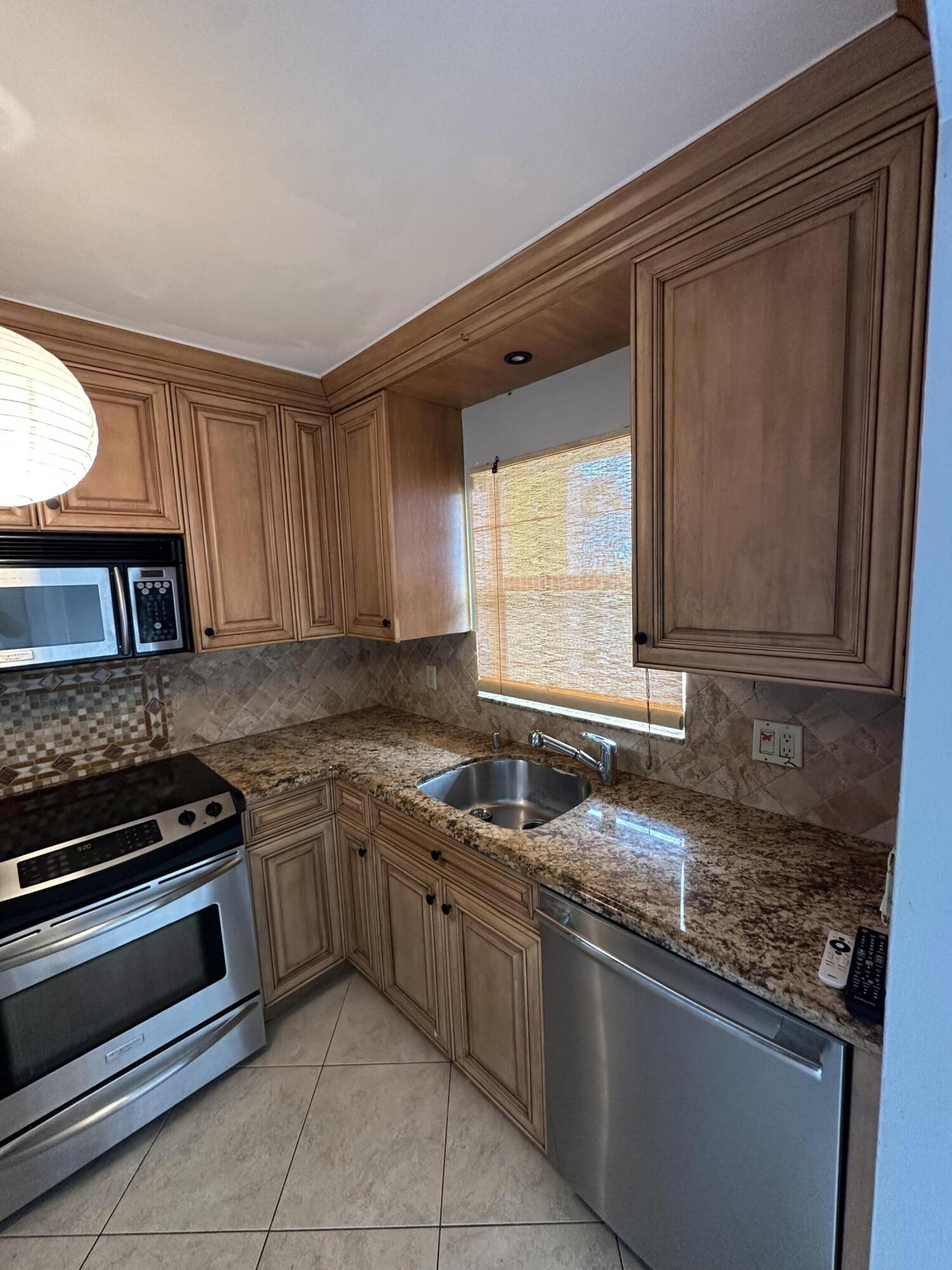 9949 Sandalfoot Boulevard, Unit 533 Boca Raton, FL 33428 - Photo 2 of 15 IMG_9566